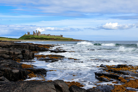 dunstanburgh 城堡在卡斯特诺森伯兰的视图