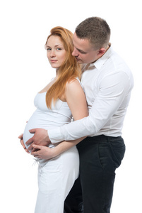 触摸妻子怀孕妇女的肚子里的男人