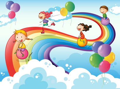 一群孩子打有彩虹的天空