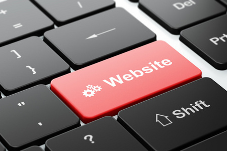 web 开发的概念 齿轮和网站上的计算机键盘背景