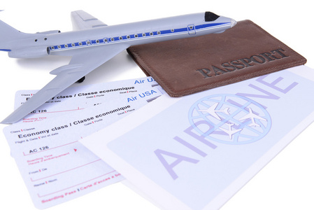 航空公司机票与护照上白色孤立图片