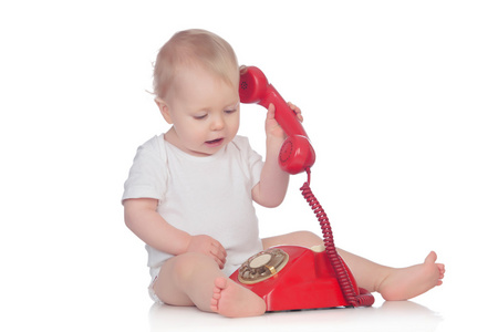 可爱的高加索宝宝玩电话
