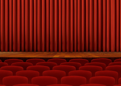 电影院两个座位和红色的窗帘