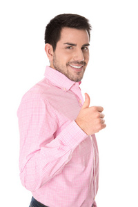成功的商人，在粉红色的衬衫，用大拇指