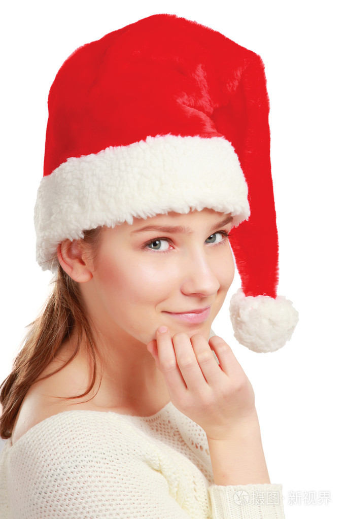 一个美丽的女人戴着圣诞老人帽子的肖像