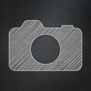 旅游概念 黑板背景上的相机拍照