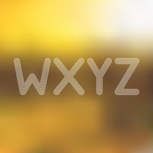 w x y z 光行字母表与模糊了焦点背景