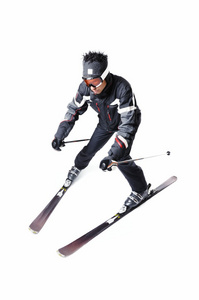 一个男性滑雪滑雪与全套设备在一个白色的背景上