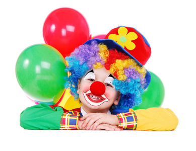 生日小丑拿着空白板照片