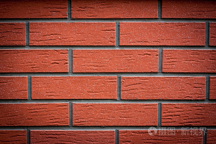 从橙色砖造墙