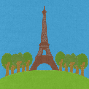 埃菲尔铁塔，巴黎。法国在绣风格的织物背景