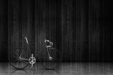 自行车在黑暗的墙上