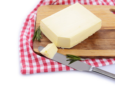 木制切菜板，孤立的白色衬底上美味黄油