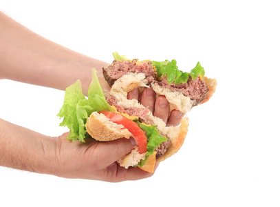 手中握有两个一半的汉堡
