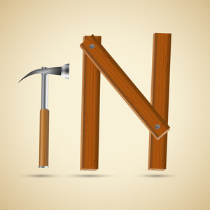木制字母 字母 n 和锤