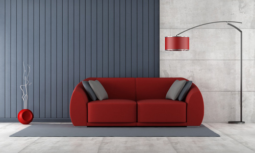 与红色长沙发上的现代生活空间。