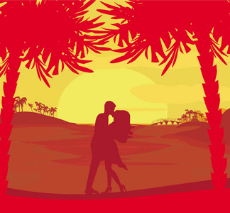 剪影情侣接吻热带海滩上