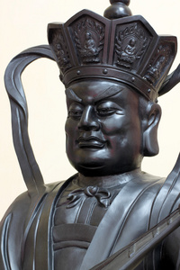 中国宗教的黑神雕像照片