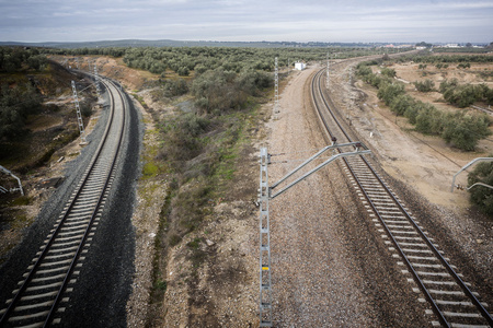 Train rails with a city at the background, Jan, Spain