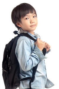 亚洲男孩与学校背包