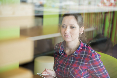 Woman in caf