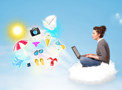 年轻的商人坐在云与便携式计算机