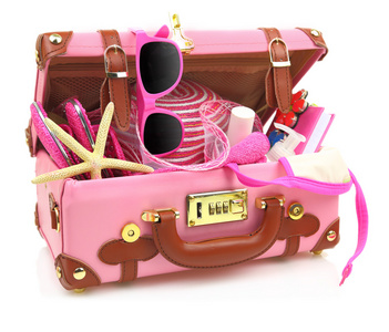 准备旅游带夏季设备隔离的粉红色的手提箱
