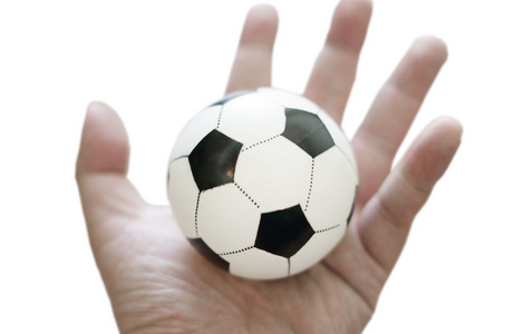 足球玩具隔离，在控制概念的手里