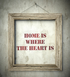 家是心之所在的旧的木制框架图片