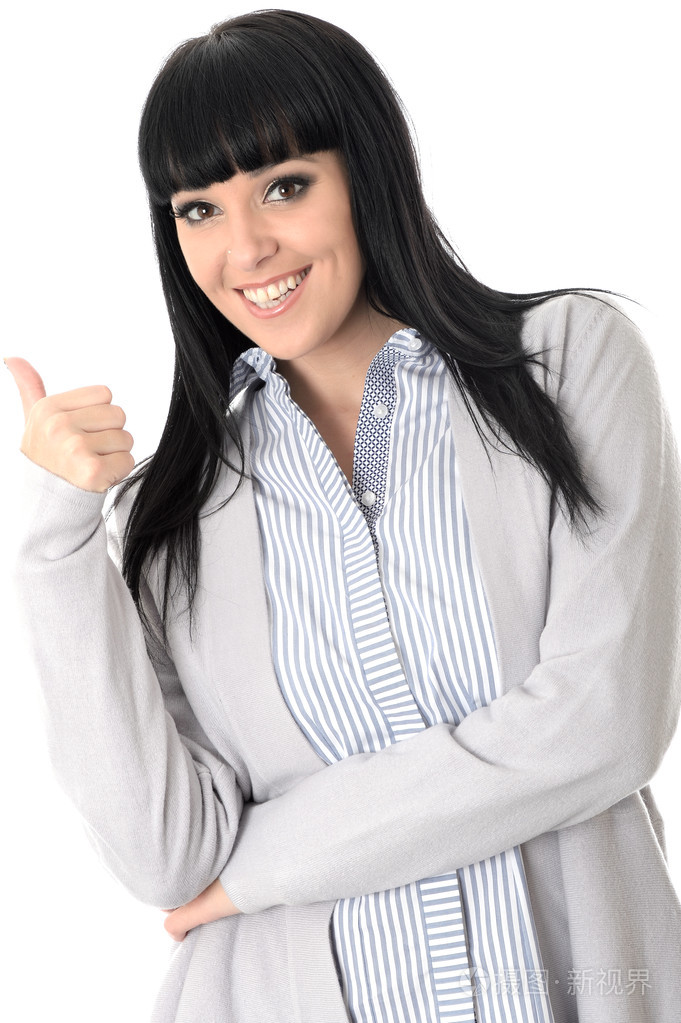 幸福的年轻女人竖起大拇指