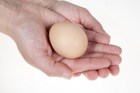 手拿鸡蛋图片