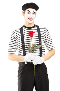 男性 mime 艺术家握玫瑰