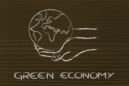 绿色经济 手里拿着这个星球