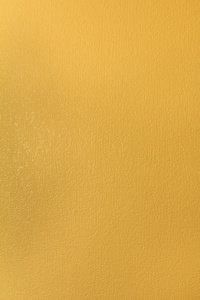 黄色垃圾墙，带纹理的背景