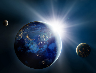 行星和卫星在太空中日出照片