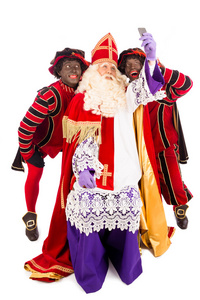 圣诞老人和 zwarte piet 采取自拍照