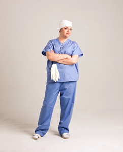 夫人医生 clinicall 衣服和外科手术手套