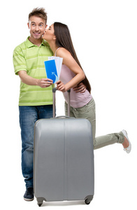 夫妇与行李箱和门票图片