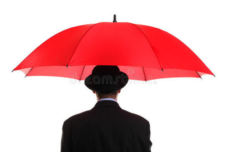 举着红举着红伞的商人照片