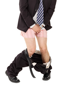 医疗和妇科问题的概念穿牛仔裤的男人用手捂住裤裆年轻人感觉疼痛在他