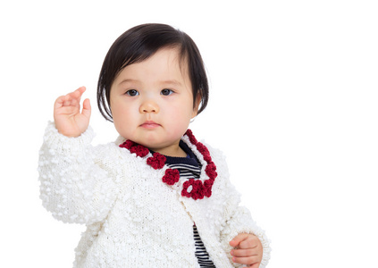 亚洲女婴和举手打招呼图片