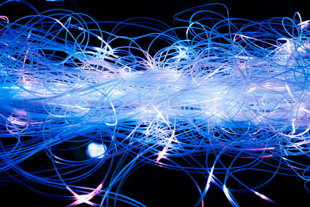 抽象照亮蓝色光纤电线