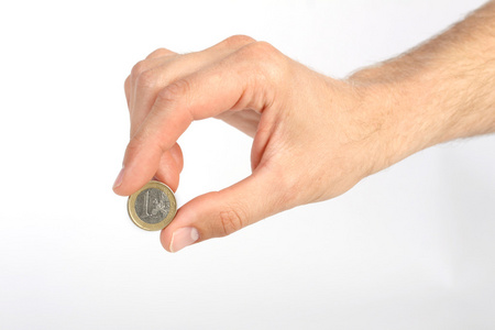 男人的手一欧元硬币上白色背景