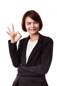亚洲商界女强人显示 ok 手标志微笑快乐