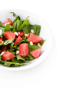 sallad med vattenmelon, lk, ruccola och spenat blad p plattan