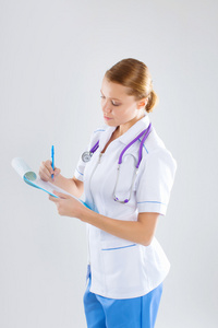 健康护理及医疗概念女医生用听诊器