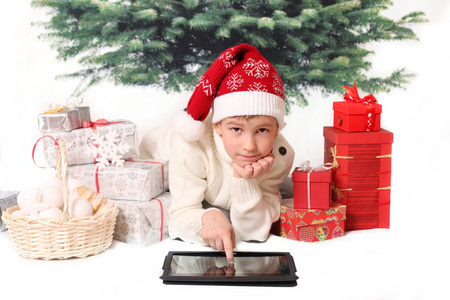 圣诞老人男孩与平板电脑