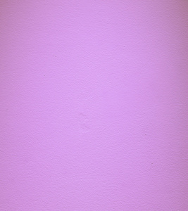 混凝土的紫色墙背景