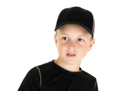 不看着照相机的年轻男孩棒球运动员的肖像