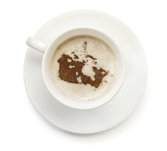 一杯加有泡沫和粉末的加拿大形状的咖啡。系列